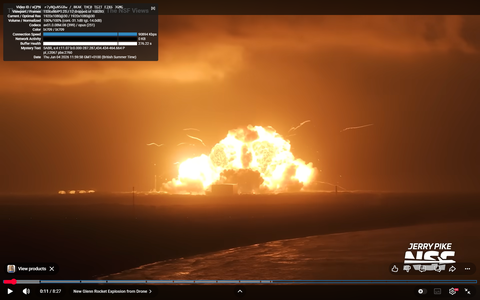 Footage frame ~+9 s — debris in flight